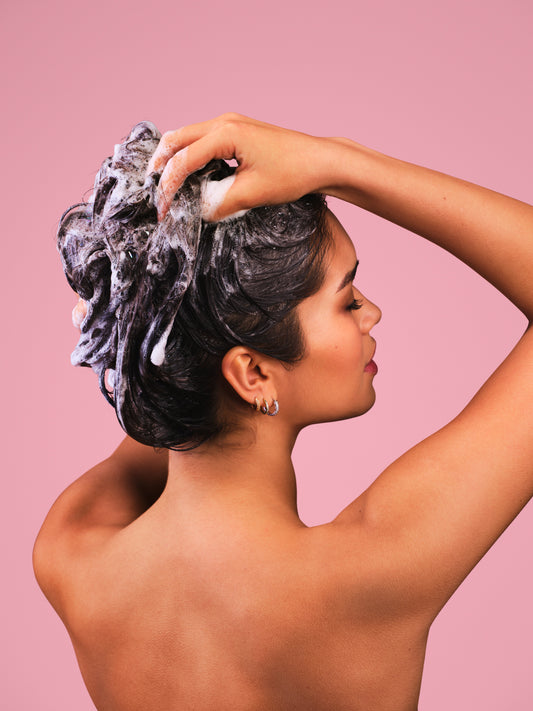 The Double Wash: Why Your First Lather is “Lying” to You