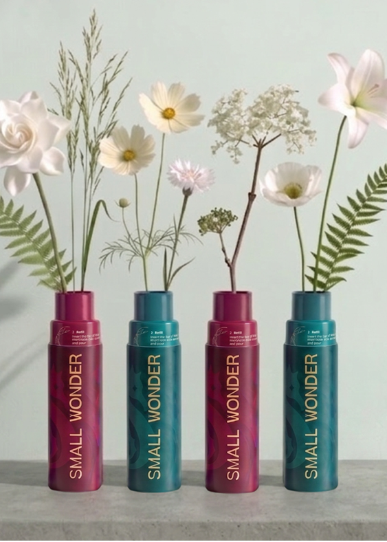 Four Small Wonder refill bottles with flowers in them